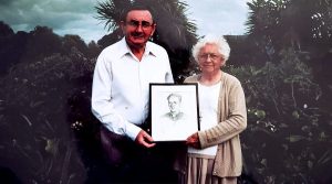 Sr Noreen Dennehy and Judge Hugh O’Flaherty holding a portrait of Msgr Hugh O’Flaherty, who saved thousands of lives during the Nazi occupation of Italy.